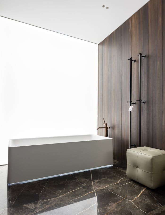 Interior of stylish bathroom with tub